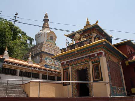 A Buddhist monastery at the base of the hill