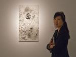 Sonya and a Dehua porcelain tile