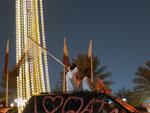 Men sitting on car roof