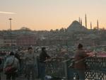 Fishermen with mosque in background